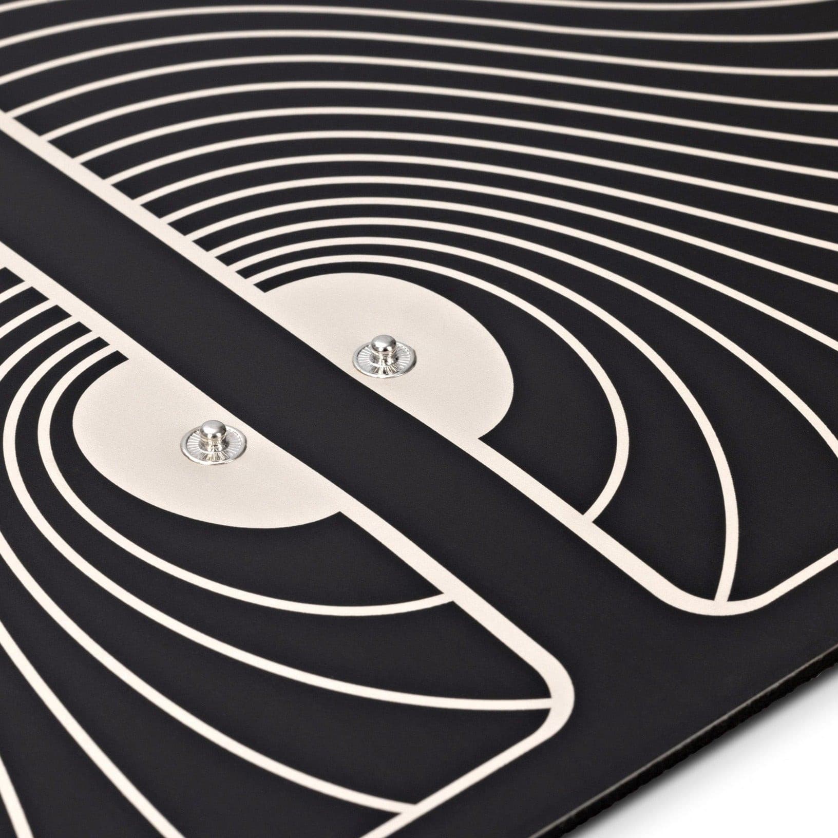 TENS Comfee Foot Pad. Black and white striped for TENS machine. Pad only in photo, close up of the metal connectors where the TENS machine would clip into.